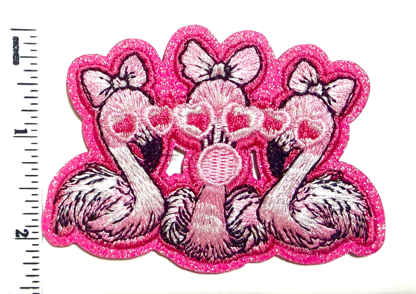 Pink flamingo trio blowing bubble 3.25