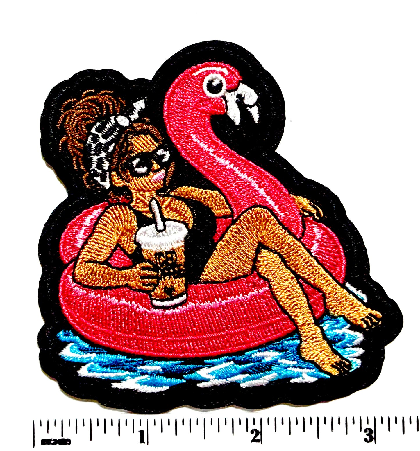 Girl with Messy Bun on a Flamingo Pool Float patch - Embroidered DIY Iron-On Applique 3”