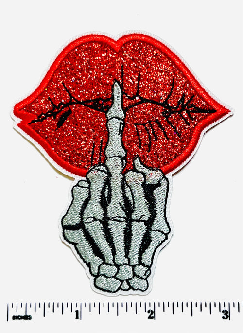 Red glitter lips with skeleton middle finger 3.5”