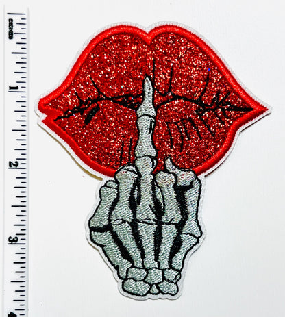 Red glitter lips with skeleton middle finger 3.5”