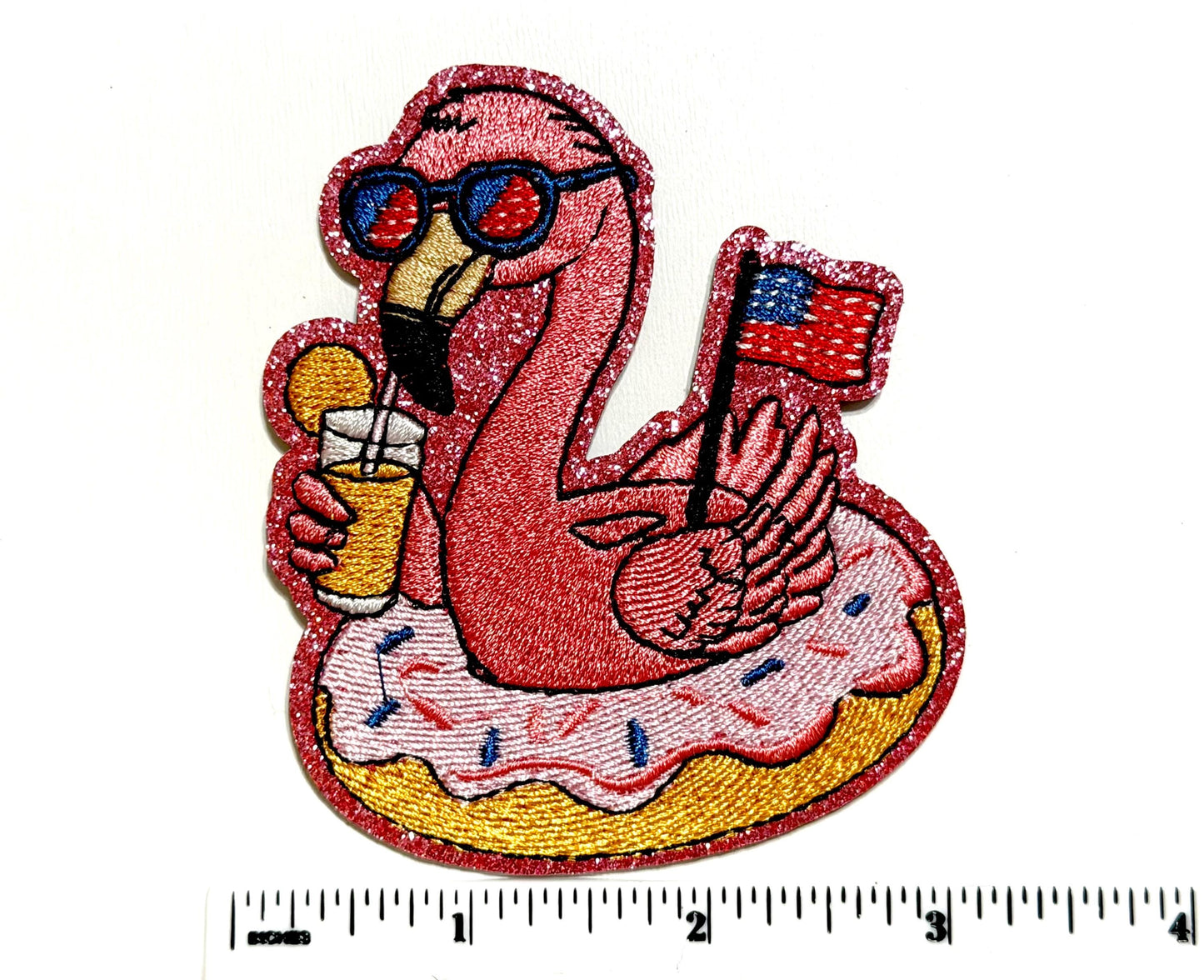 Embroidered Pink Flamingo – Glittery Patriotic Donut Float 3.25”